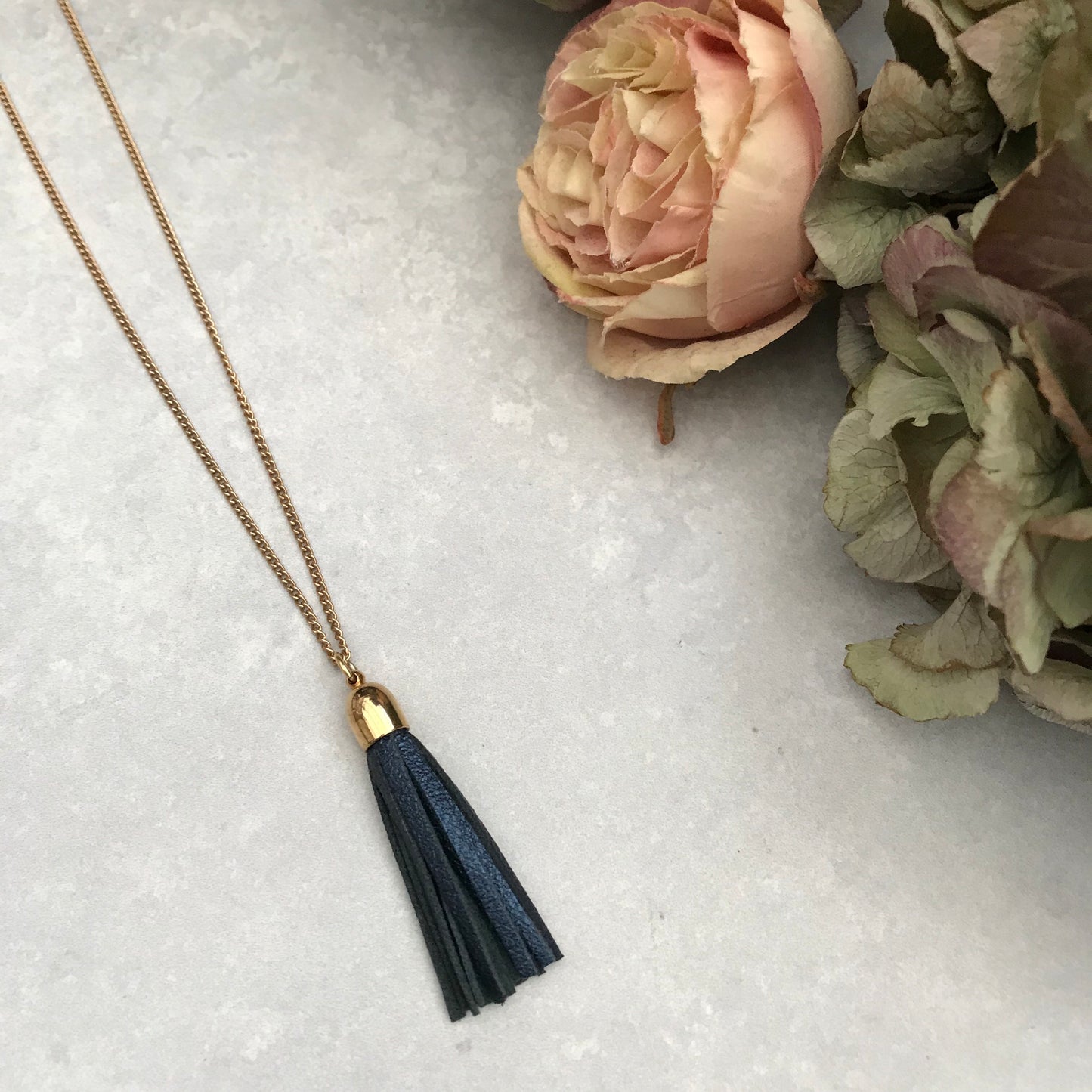Tassel Necklace - metallic blue leather